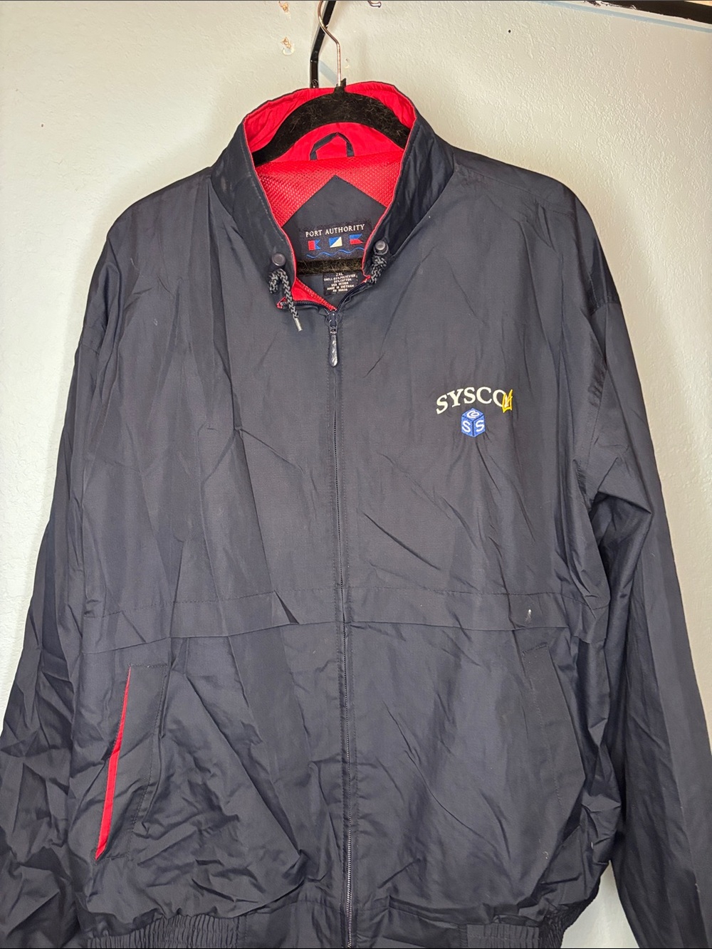 Port Authority Black Windbreaker with Red Trim and Embroidered Logo